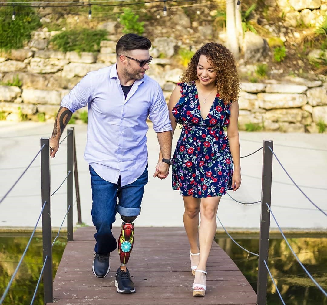 JP and Crystal Lane walk hand in hand, his Iron Man-themed prosthetic a quiet nod to the humor and resilience he has built into his recovery. Photo courtesy of JP and Crystal Lane