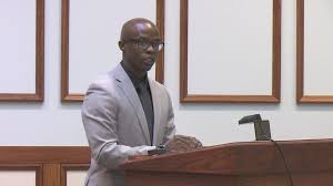 Neal speaking before the Calloway County Fiscal Court in Murray, Kentucky, advocating for the removal of a Confederate monument. (Photo by Chris Yu)